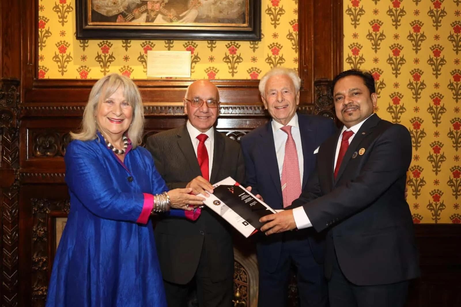 Lord Michael Levy, British MP Virender Sharma, and Baroness Helena Kennedy presenting the World's Emerging Leader Award to Syam P. Prabhu at the House of Lords, London