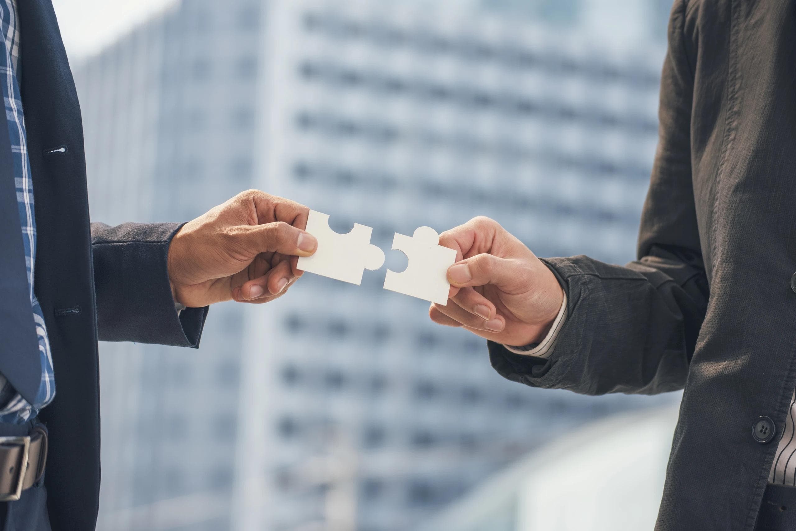 Business partners signing a company formation agreement