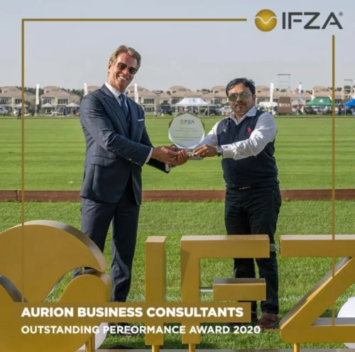 Receiving Outstanding performance award from IFZA, Dubai