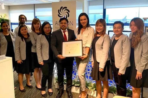 AURION receiving Appreciation Award from Justina Pereckate, IFZA’s Head of Client Relations.